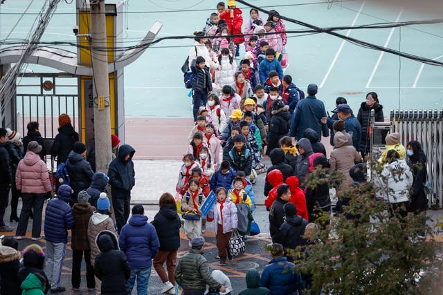 <p>Students are dismissed from a school in Beijing amid virus outbreak </p>