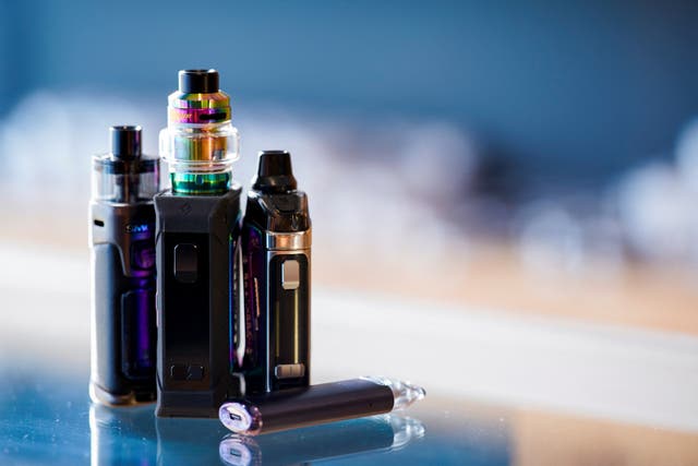 <p>Vape pens stand on a counter at a vape store, in Melbourne, Australia</p>