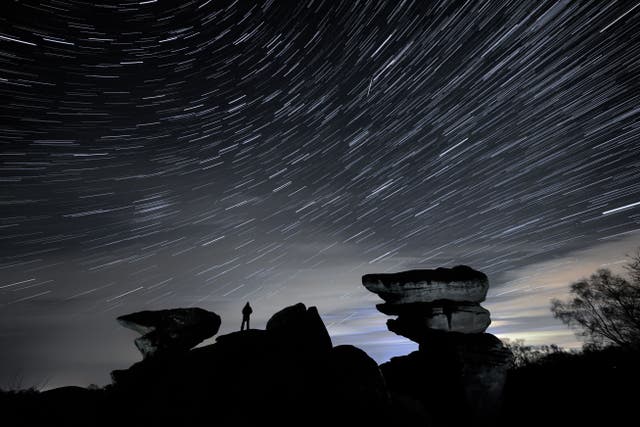 The last meteor shower of the year will light up the night sky on Thursday, giving sky gazers a chance to see the celestial display without staying up too late (PA)