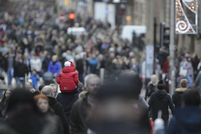 <p>Shoppers on Buchanan Street in Glasgow city centre</p>