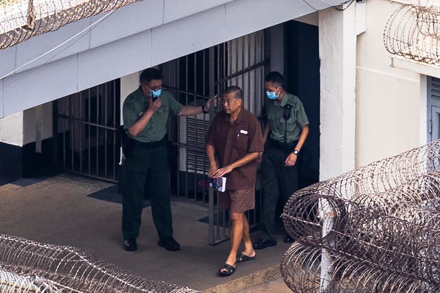 <p>File: Jimmy Lai walks through the Stanley prison in Hong Kong </p>