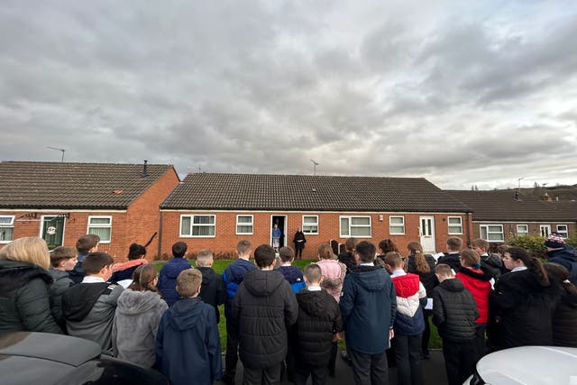 <p>Cath Whitehead was overwhelmed with emotion when her whole village showed up at her door to sing Christmas carols</p>