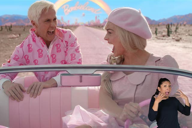 <p>Ryan Gosling and Margot Robbie in ‘Barbie’, with ASL interpreter Leila Hanaumi </p>